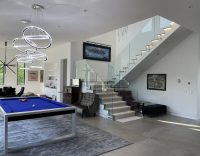 livingroom main home elevator contemporary modern mansion estate los angeles california film location rental by owner