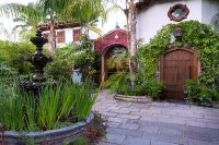 spanish courtyard fountain red tile palm springs casademontevista